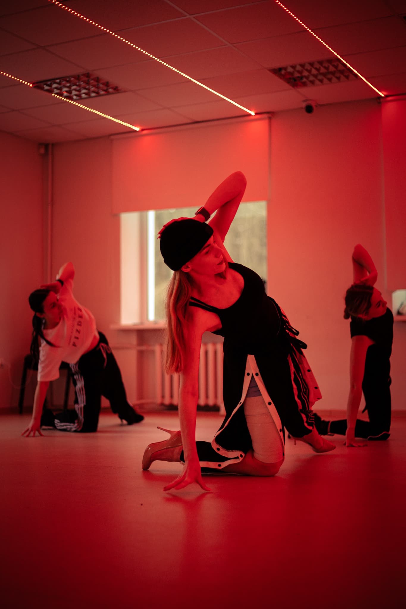 Dance Code mirror practice in dark premium dance studio